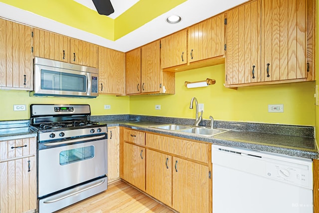 9963 Constitution Dr, Orland Park, IL 60462 - kitchen with appliances with stainless steel finishes, light wood-style flooring, dark countertops, recessed lighting, and a ceiling fan