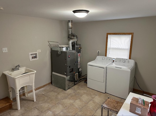 9957 Moody Ave, Oak Lawn, IL 60453 - laundry area with separate washer and dryer and baseboards
