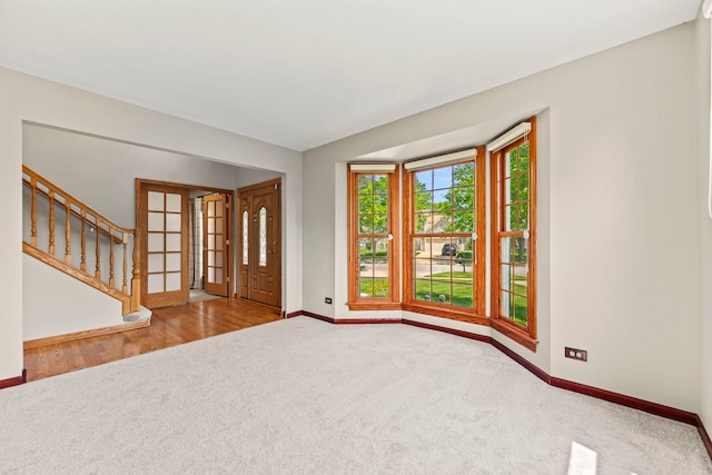 1164 Winding Glen Dr, Carol Stream, IL 60188 - carpeted foyer entrance featuring baseboards and stairs