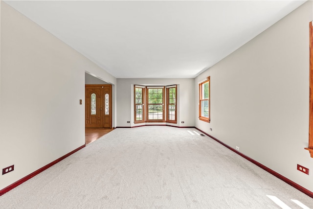 1164 Winding Glen Dr, Carol Stream, IL 60188 - carpeted empty room featuring baseboards