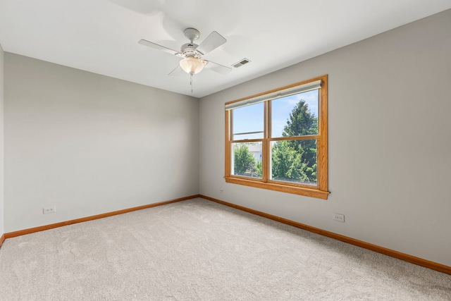 1164 Winding Glen Dr, Carol Stream, IL 60188 - carpeted empty room featuring baseboards and ceiling fan