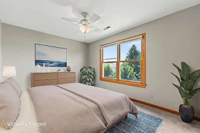 1164 Winding Glen Dr, Carol Stream, IL 60188 - carpeted bedroom with baseboards and ceiling fan