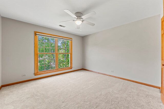 1164 Winding Glen Dr, Carol Stream, IL 60188 - unfurnished room featuring light colored carpet and a ceiling fan
