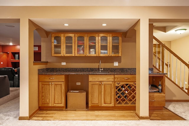 1164 Winding Glen Dr, Carol Stream, IL 60188 - indoor wet bar with stairway, light carpet, recessed lighting, and light wood finished floors