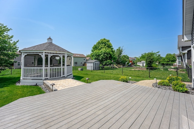 1164 Winding Glen Dr, Carol Stream, IL 60188 - deck featuring a gazebo, a fenced backyard, and a storage shed