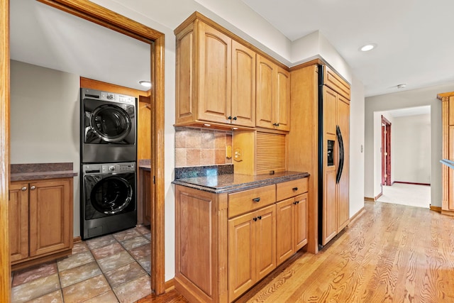 1164 Winding Glen Dr, Carol Stream, IL 60188 - washroom featuring stacked washing machine and dryer and recessed lighting