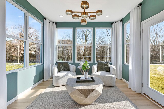 425 Freedlund Ct, Batavia, IL 60510 - sunroom featuring plenty of natural light and a chandelier