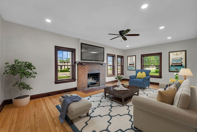 212 S Columbia Ave, Oglesby, IL 61348 - living area with hardwood / wood-style floors, a ceiling fan, recessed lighting, and a brick fireplace