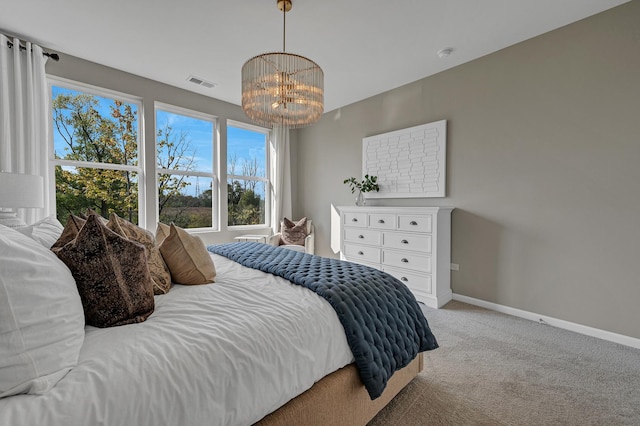266 Branson Dr, Batavia, IL 60510 - bedroom with a chandelier, light colored carpet, and multiple windows