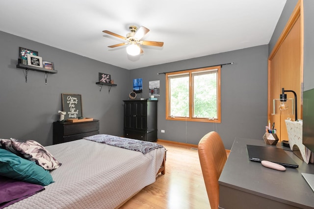 10935 Conifer Ct, Orland Park, IL 60467 - bedroom with light wood-style flooring and ceiling fan