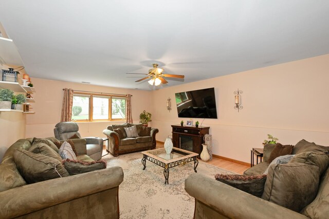 10935 Conifer Ct, Orland Park, IL 60467 - living room featuring a ceiling fan and light wood-type flooring