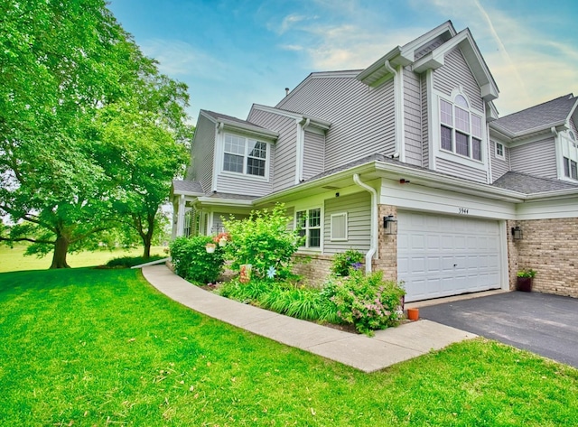 3944 Garnette Ct, Naperville, IL 60564 - view of front of property with driveway, brick siding, a garage, and a front yard