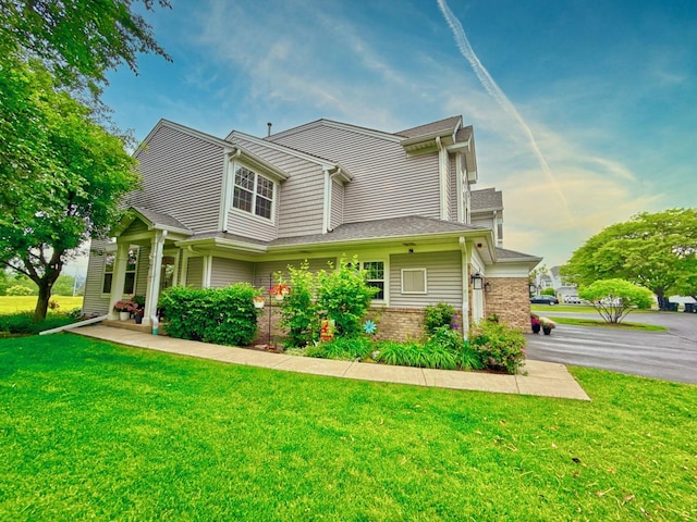 3944 Garnette Ct, Naperville, IL 60564 - view of property exterior with a lawn and brick siding