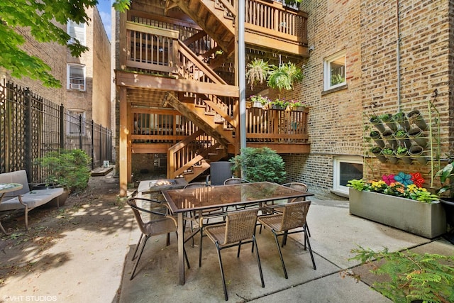 5359 N Paulina St Unit 2, Chicago, IL 60640 - view of patio with stairway and outdoor dining space