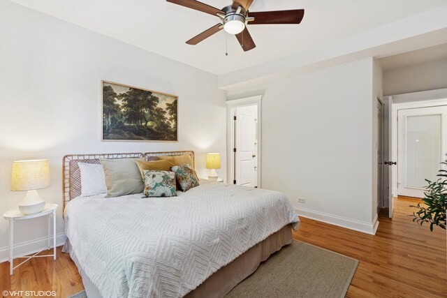 5359 N Paulina St Unit 2, Chicago, IL 60640 - bedroom with wood finished floors and a ceiling fan