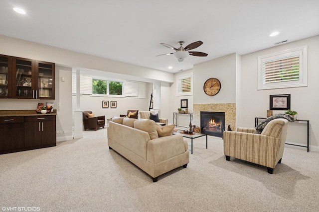 4110 N California Ave Unit 1, Chicago, IL 60618 - living area with light carpet, recessed lighting, a glass covered fireplace, and ceiling fan