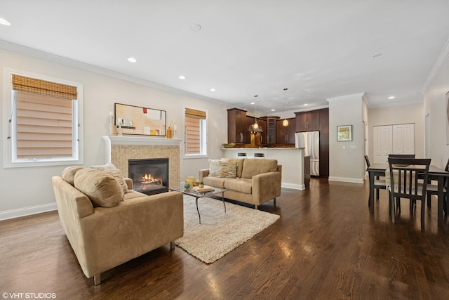 4110 N California Ave Unit 1, Chicago, IL 60618 - living room with recessed lighting, a glass covered fireplace, dark wood finished floors, and ornamental molding