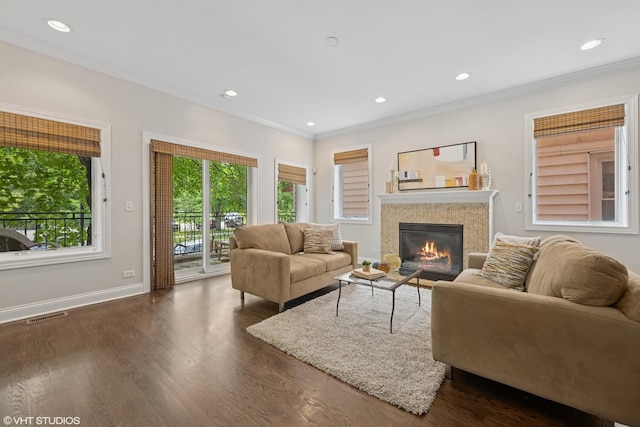 4110 N California Ave Unit 1, Chicago, IL 60618 - living room with a high end fireplace, dark wood-style floors, ornamental molding, and recessed lighting