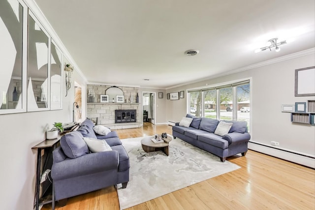 14 W Leon Ln, Prospect Heights, IL 60070 - living room with crown molding, wood finished floors, a baseboard heating unit, a stone fireplace, and baseboards
