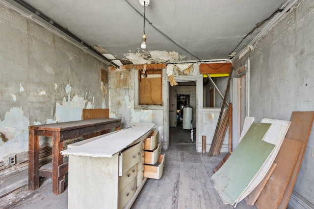 3444 S Western Ave, Chicago, IL 60608 - basement featuring water heater and wood finished floors