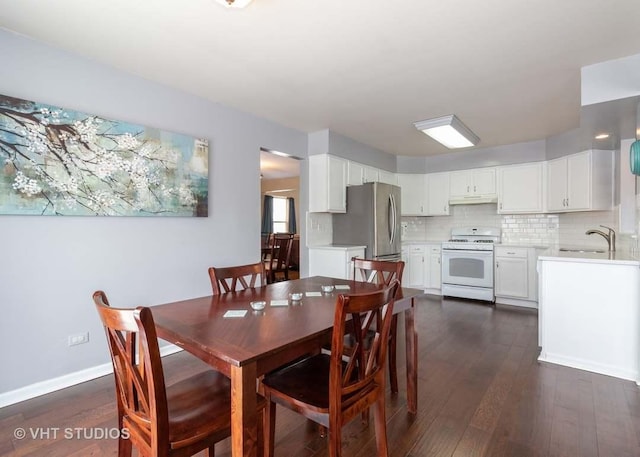 26149 S Locust Pl, Monee, IL 60449 - dining room with dark wood finished floors and baseboards