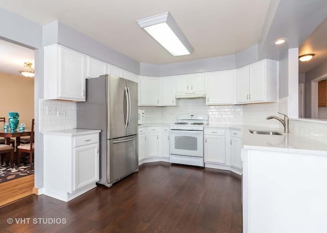 26149 S Locust Pl, Monee, IL 60449 - kitchen featuring white range with gas stovetop, freestanding refrigerator, under cabinet range hood, and dark wood-style floors