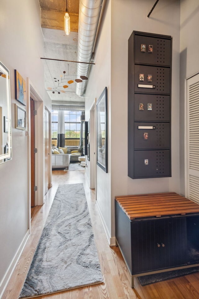 3963 W Belmont Ave Unit 137, Chicago, IL 60618 - hallway with wood finished floors and baseboards