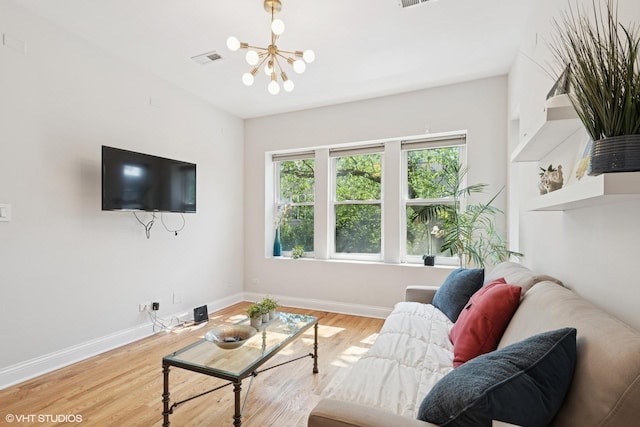 3414 N Racine Ave Unit 2, Chicago, IL 60657 - living area with a chandelier and wood finished floors