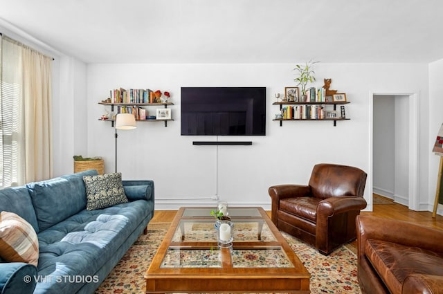 1585 Ridge Ave Unit 110, Evanston, IL 60201 - living room featuring wood finished floors and baseboards