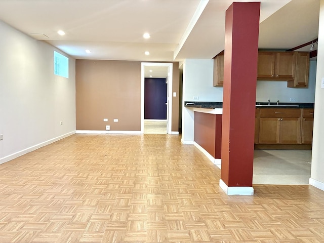 4937 S Kilpatrick Ave, Chicago, IL 60632 - kitchen with recessed lighting, baseboards, dark countertops, open floor plan, and a sink