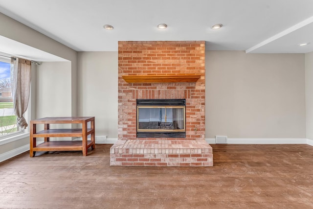 10026 Spaulding Ave, Evergreen Park, IL 60805 - living area with baseboards, wood finished floors, a brick fireplace, and recessed lighting