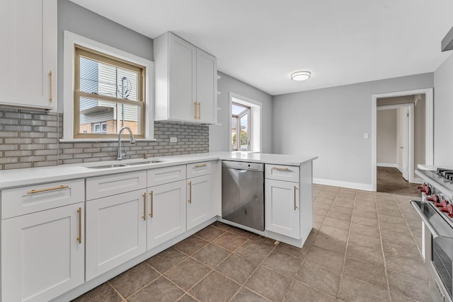 10026 Spaulding Ave, Evergreen Park, IL 60805 - kitchen with appliances with stainless steel finishes, a sink, tasteful backsplash, and white cabinetry