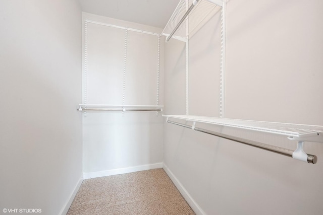 1101 S State St Unit 1805, Chicago, IL 60605 - walk in closet featuring carpet flooring