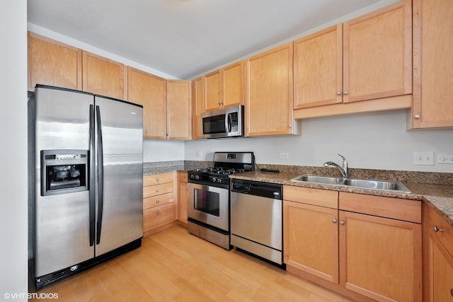 1101 S State St Unit 1805, Chicago, IL 60605 - kitchen featuring appliances with stainless steel finishes, light wood finished floors, and light brown cabinetry