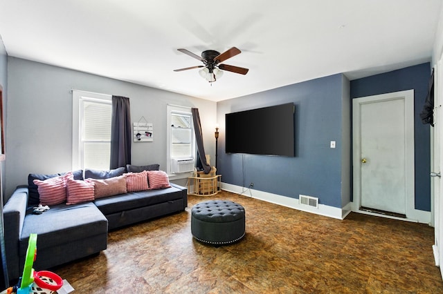 650 Pennsylvania Ave, Aurora, IL 60506 - living area featuring a ceiling fan, cooling unit, and baseboards