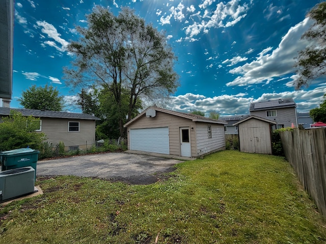 319 Hillandale St, Round Lake, IL 60073 - view of yard featuring an outbuilding and a detached garage