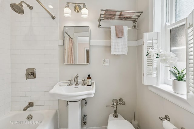 542 Michigan Ave Unit 1, Evanston, IL 60202 - bathroom with shower / bath combo with shower curtain and healthy amount of natural light