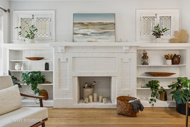 542 Michigan Ave Unit 1, Evanston, IL 60202 - living room with wood finished floors, built in features, plenty of natural light, and a fireplace