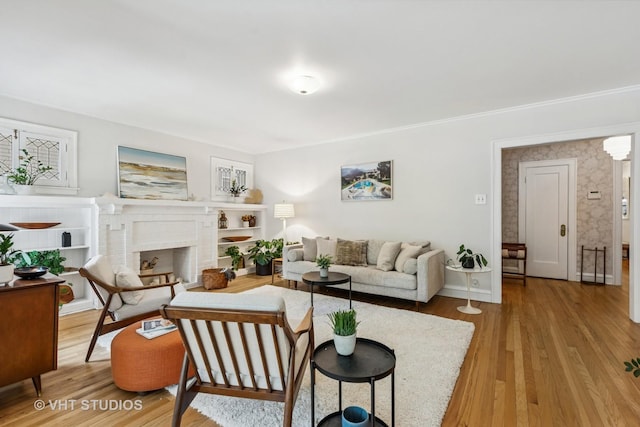 542 Michigan Ave Unit 1, Evanston, IL 60202 - living area featuring light wood finished floors and a fireplace