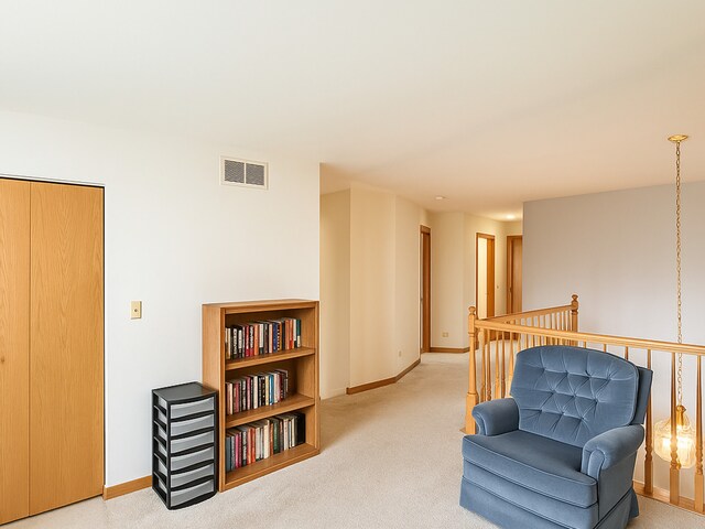 34251 N Homestead Rd, Gurnee, IL 60031 - sitting room with carpet flooring and an upstairs landing