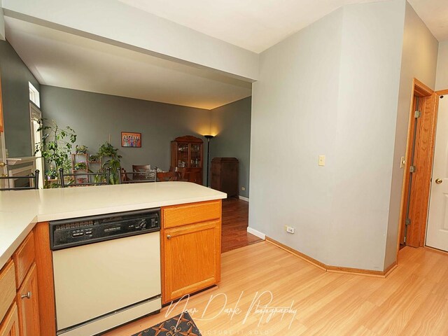 34251 N Homestead Rd, Gurnee, IL 60031 - kitchen featuring dishwasher, light wood-style flooring, a peninsula, and light countertops