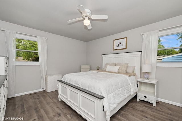 505 Crest Dr, Cary, IL 60013 - bedroom featuring multiple windows, dark wood-style flooring, and ceiling fan