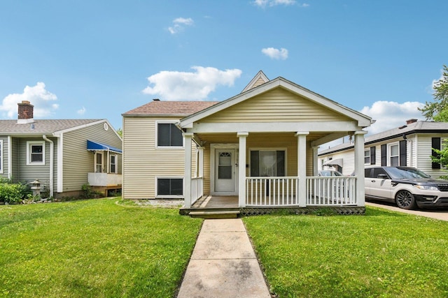 17852 Walter St, Lansing, IL 60438 - view of front of property featuring a porch and a front yard