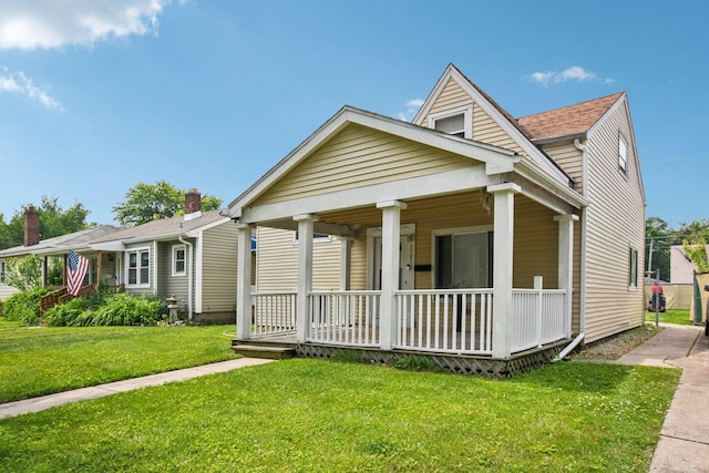 17852 Walter St, Lansing, IL 60438 - view of front of property featuring a porch and a front lawn