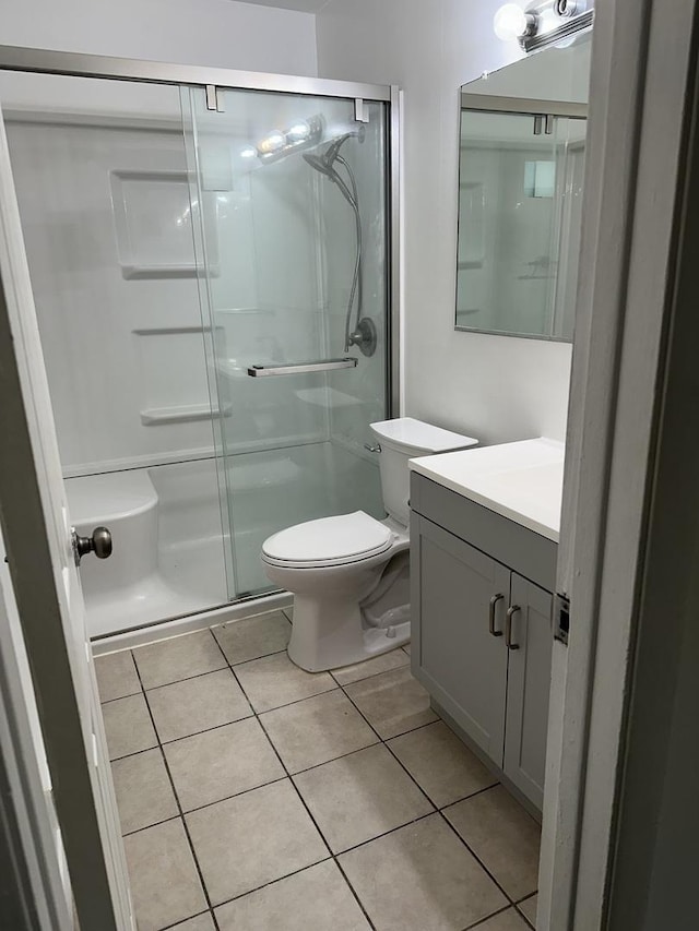 833 N Randall Rd Unit C3, Aurora, IL 60506 - bathroom with vanity, a shower stall, and tile patterned floors