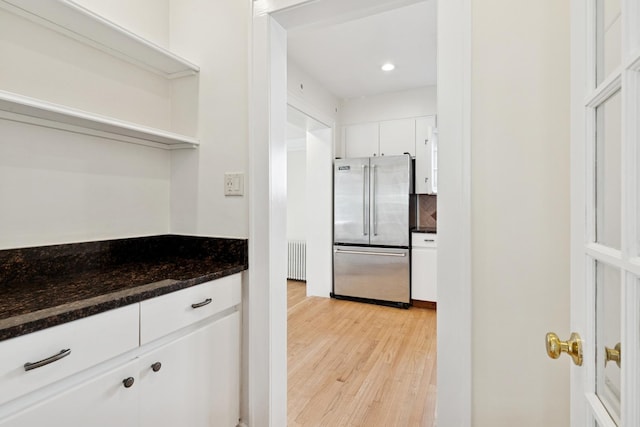 720 Ingleside Pl, Evanston, IL 60201 - kitchen featuring high end refrigerator, radiator heating unit, white cabinets, light wood-style floors, and decorative backsplash