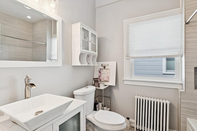 720 Ingleside Pl, Evanston, IL 60201 - full bath featuring radiator heating unit, vanity, a shower, and a tub