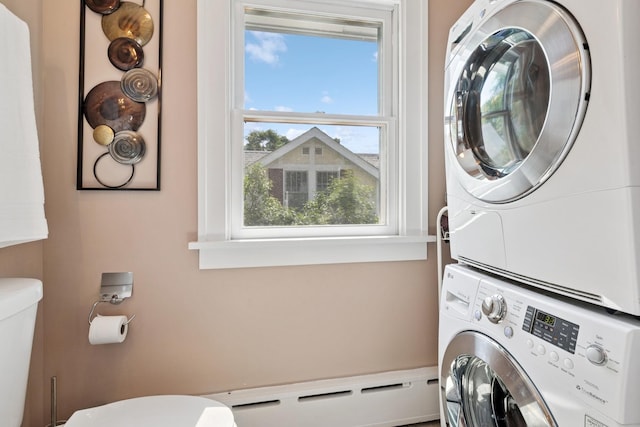 720 Ingleside Pl, Evanston, IL 60201 - laundry room featuring baseboard heating and stacked washer / dryer