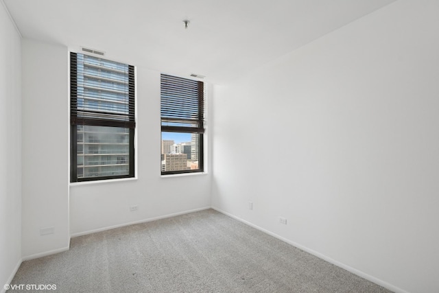 780 S Federal St Unit 1006, Chicago, IL 60605 - carpeted spare room featuring baseboards