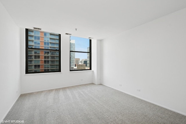 780 S Federal St Unit 1006, Chicago, IL 60605 - unfurnished room with carpet and baseboards